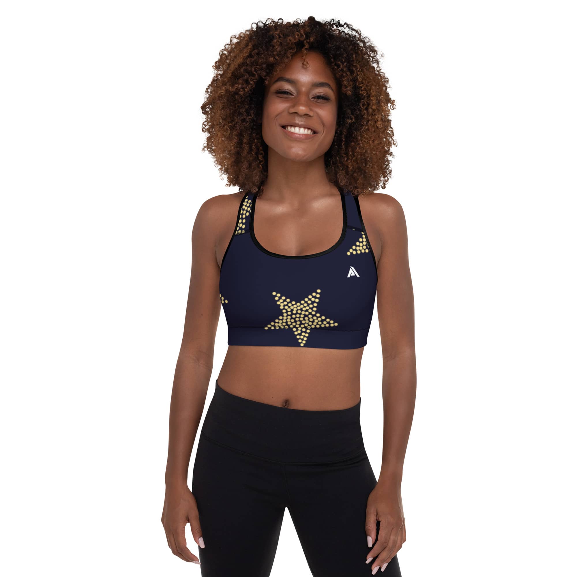 Femme portant une brassière de sport couleur bleu nuit avec des étoiles dorées imprimées vue de face